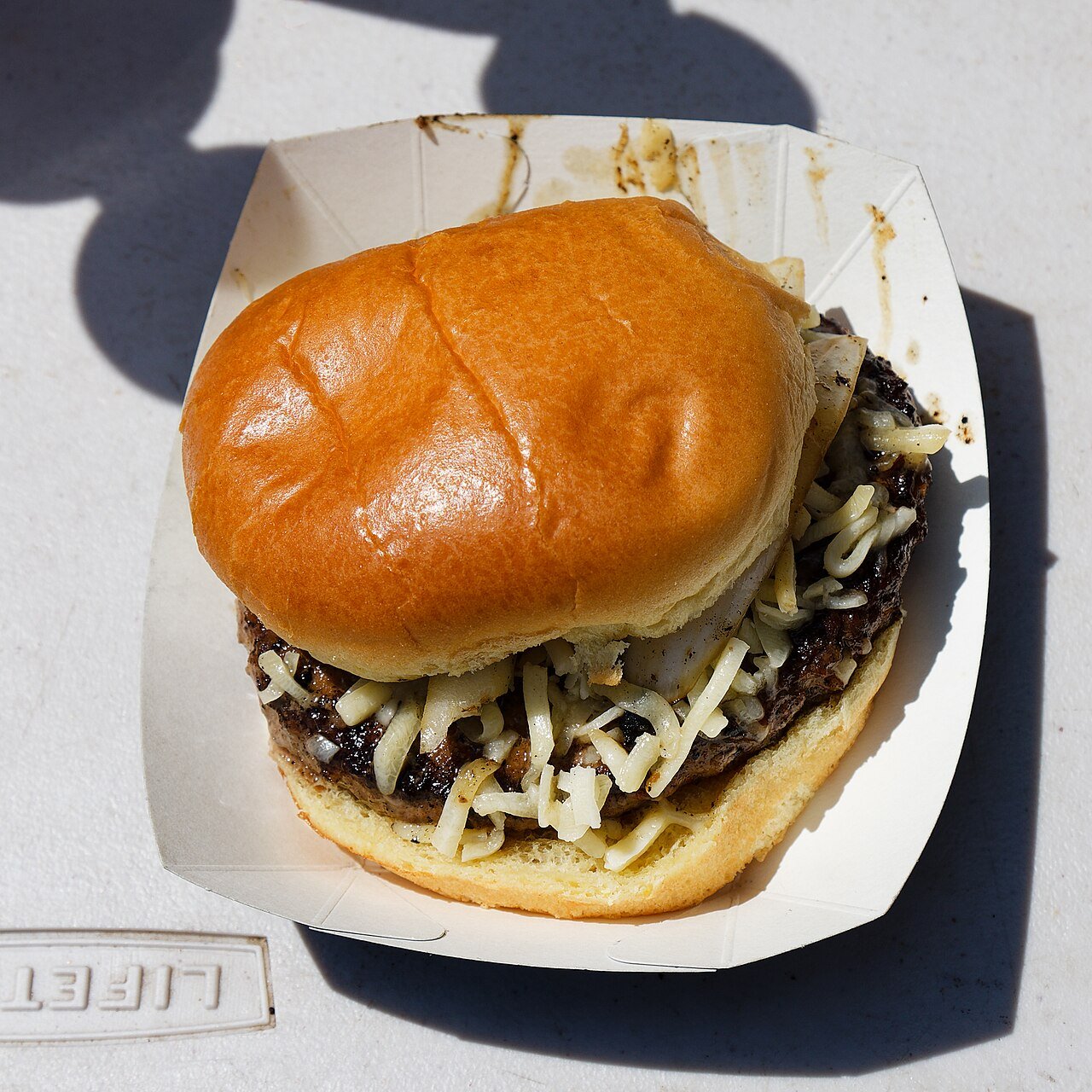 Cheeseburger20with20onion20at20Hatfield20Heath20Festival202023.jpg Triple Stack Burger - Image 1